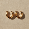 Aretes ARO GOLD dorado tubular grueso con acabado espejo pulido