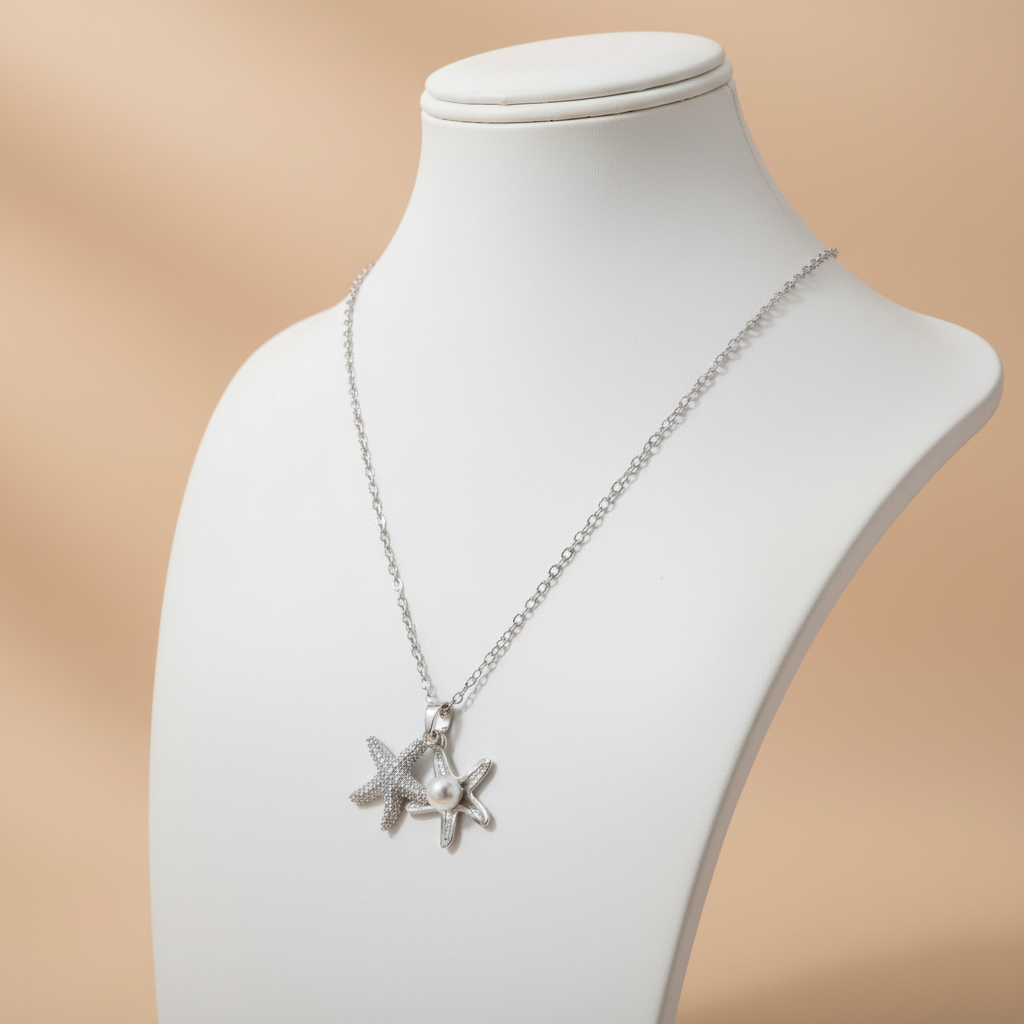 Collar ESTRELLA MAR cadena plateada con doble dije de estrella de mar con cristales y perla