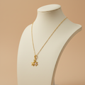 Collar ESTRELLA TORTUGA cadena dorada con dije de estrella de mar y tortuga con cristal rosa